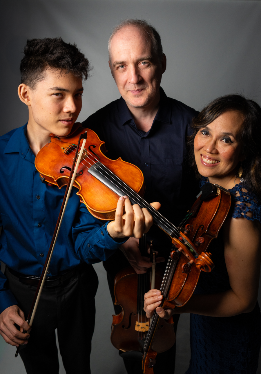 Shih-Pogrebnoy Family holding instruments
