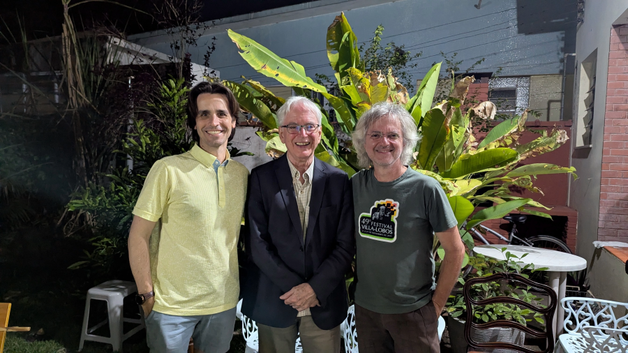 Philip Borter poses with Brazilian cello professors